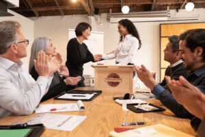 Applauding a speaker at a Toastmasters meeting